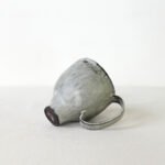 hand-built-black-clay-cup-high-footed-wabi-sabi-mug