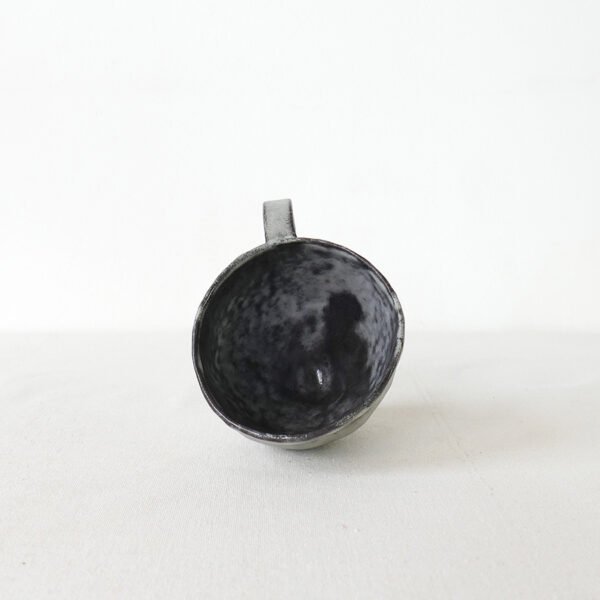 hand-built-black-clay-cup-high-footed-wabi-sabi-mug