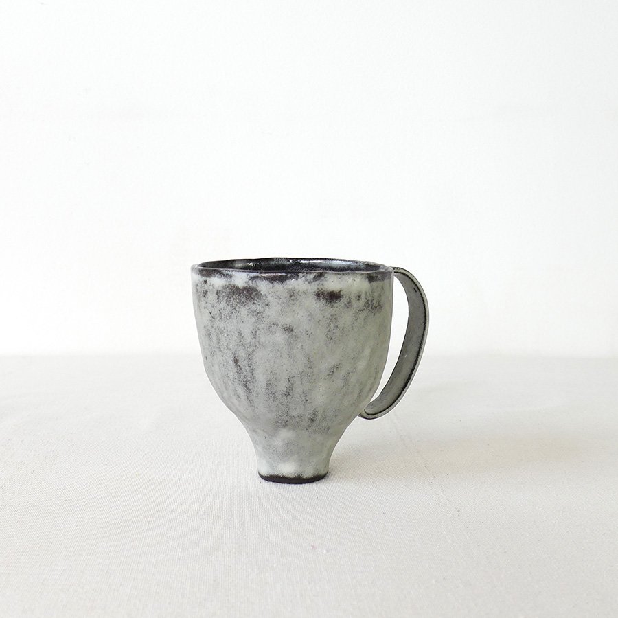 hand-built-black-clay-cup-high-footed-wabi-sabi-mug