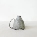hand-built-black-clay-cup-high-footed-wabi-sabi-mug