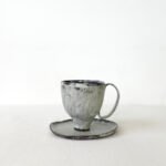 hand-built-black-clay-cup-high-footed-wabi-sabi-mug