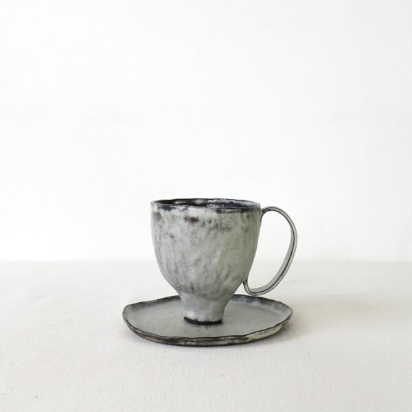 hand-built-black-clay-cup-high-footed-wabi-sabi-mug